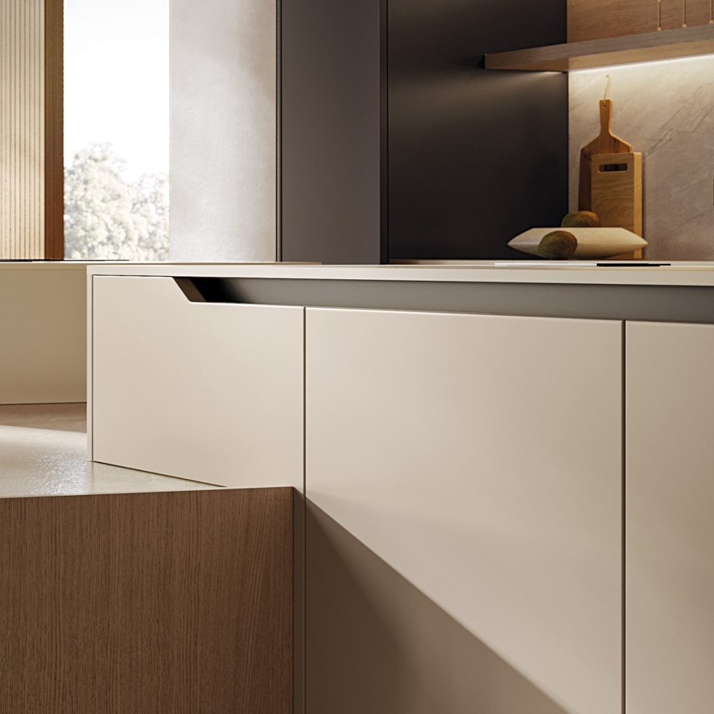 Close-up of the new Sinua handle from the Arredo3 Time Collection, integrated with the gola profile on a modern Italian kitchen island featuring matte lacquered doors and clean, minimalist lines for luxury contemporary kitchens.